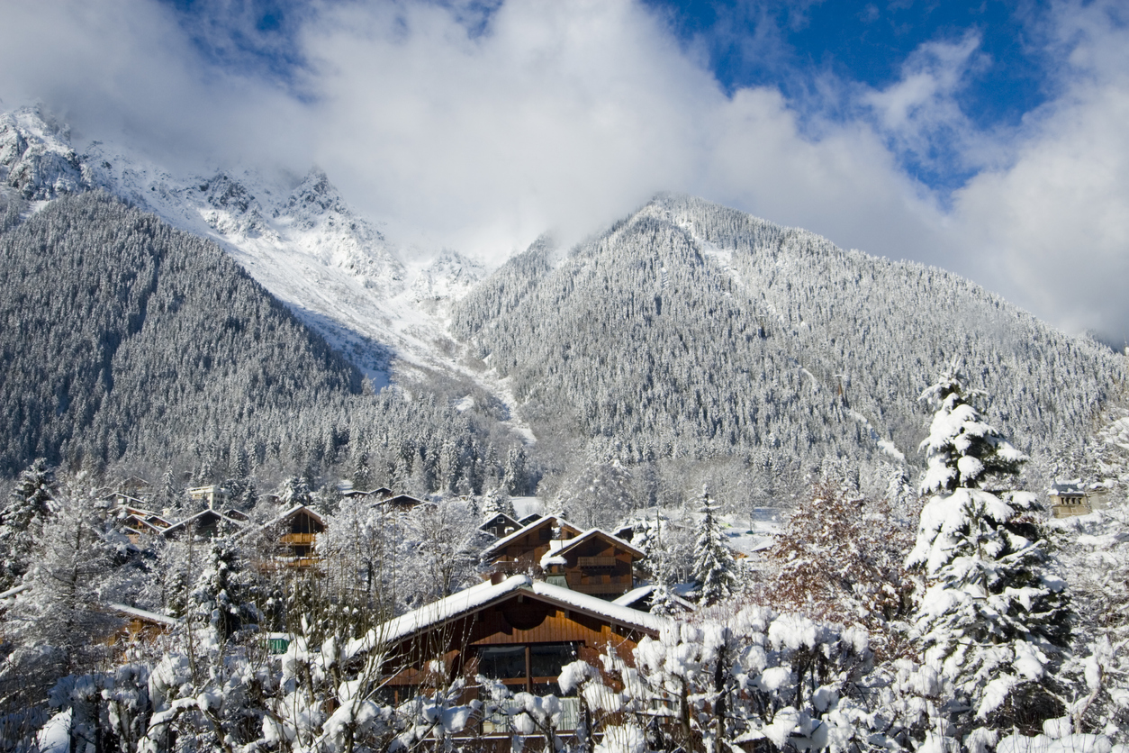 Traditional wooden Alpine houses seen at Brevent-Fleger ski resort, France.