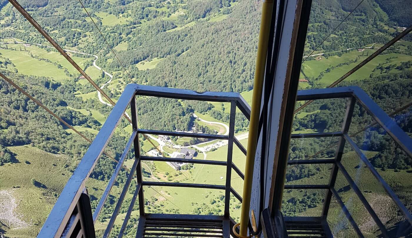 View of the valley and mountains from the cable car in Fuente De